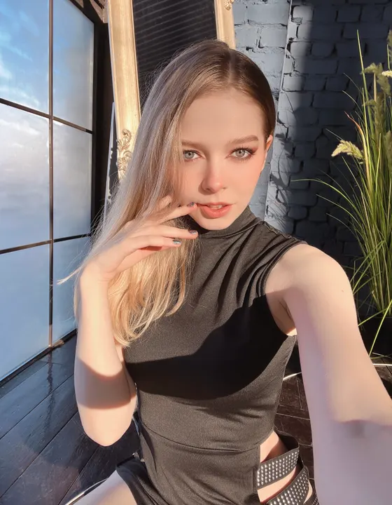 Black top by a window