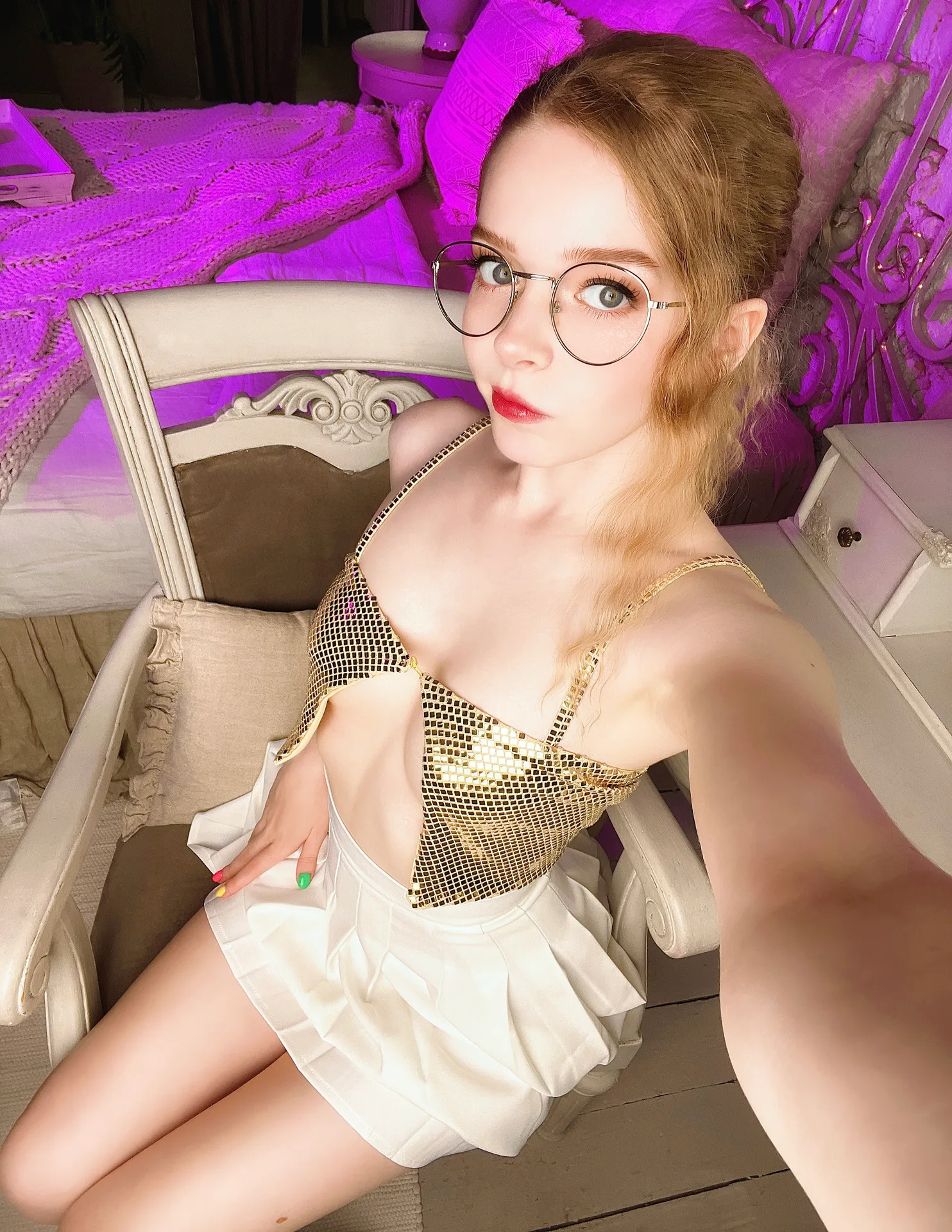 Gold sequin top and white skirt selfie