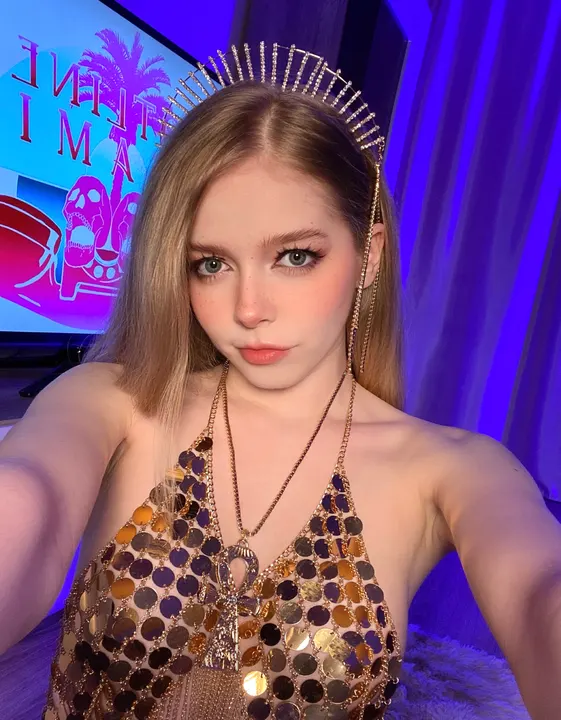 Sequin halter and a spiked headpiece