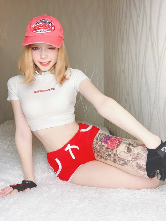 White crop top and red shorts