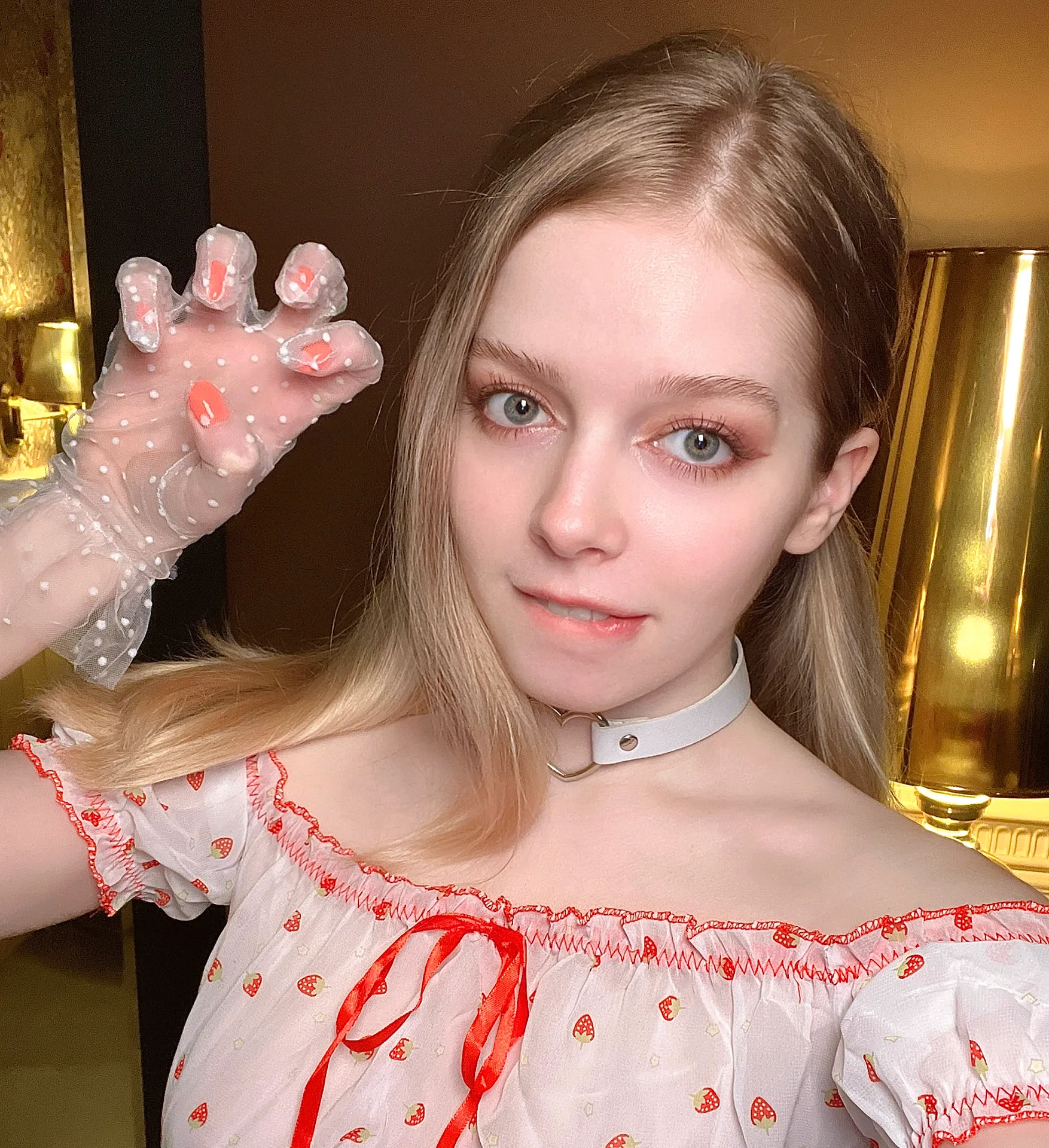 White top with red ties